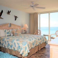 Master suite with king bed and seating area