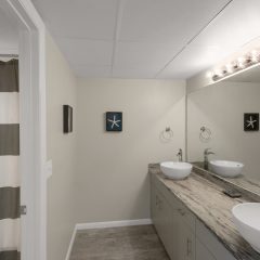 Master bath wtih dual sinks and jetted tub/shower combination