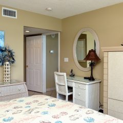 Desk area. Flat screen TV in armoire