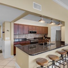 Kitchen with granite counters, custome cabinetry stainless appliances