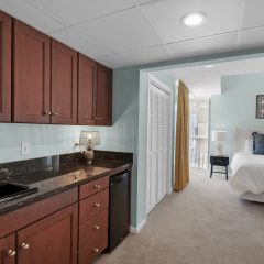 Kitchenette area in 2nd master suite with sink and refrigerator